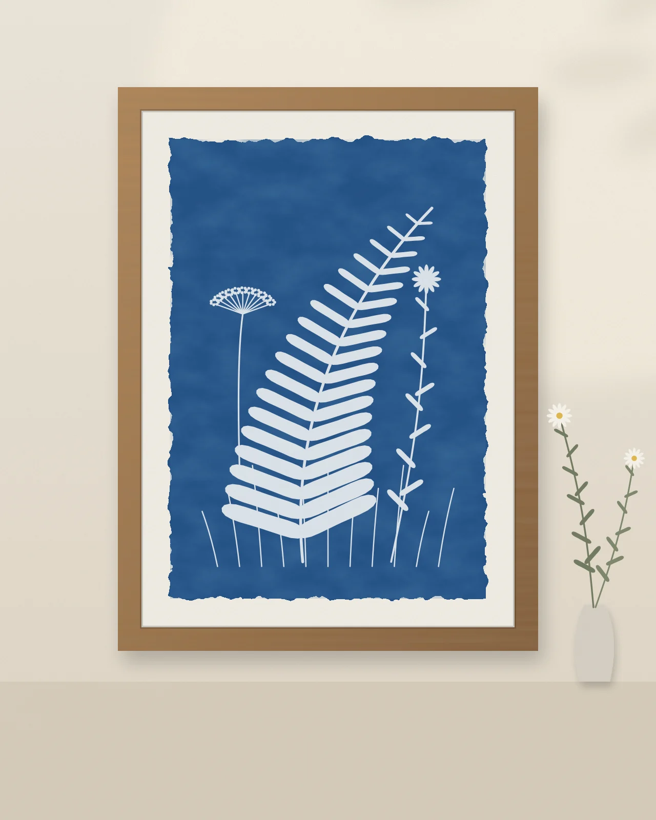 Illustration: a framed cyanotype of fern and wildflowers